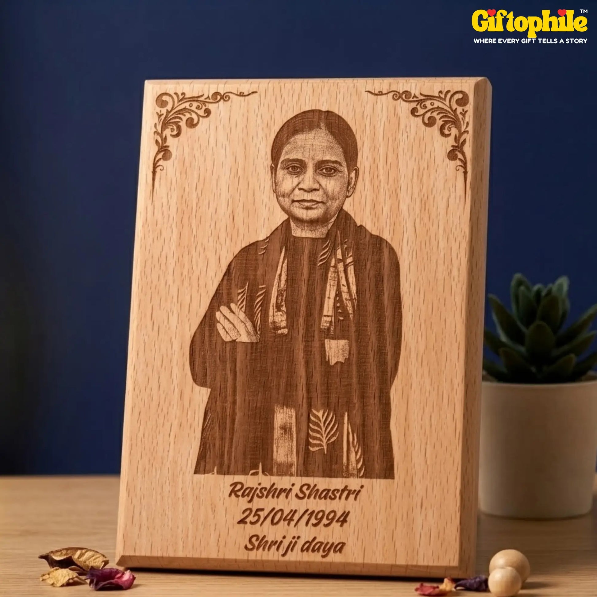 Wooden plaque with engraved portrait and text on a blue background